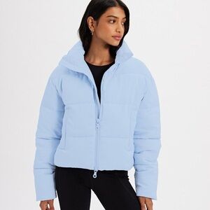 girlfriend collective cropped recycled puffer in serenity blue